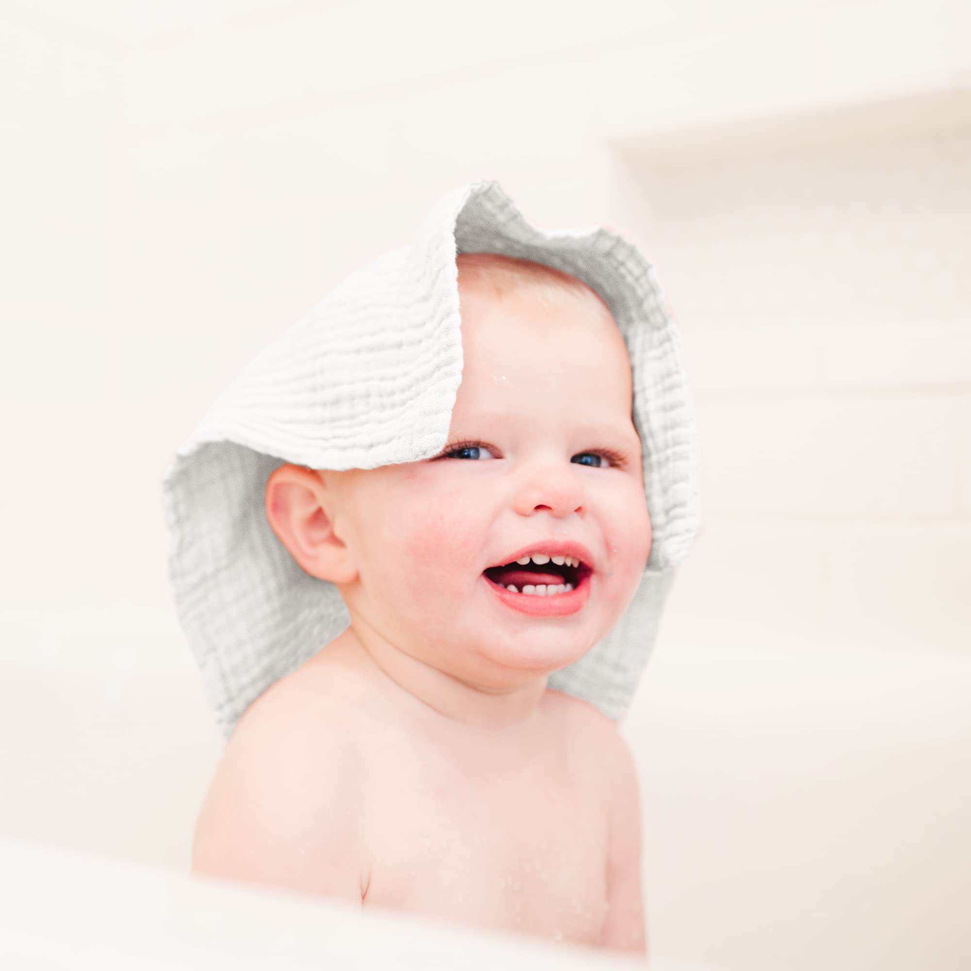 Bath time scene with Konssy washcloths offering gentle care.