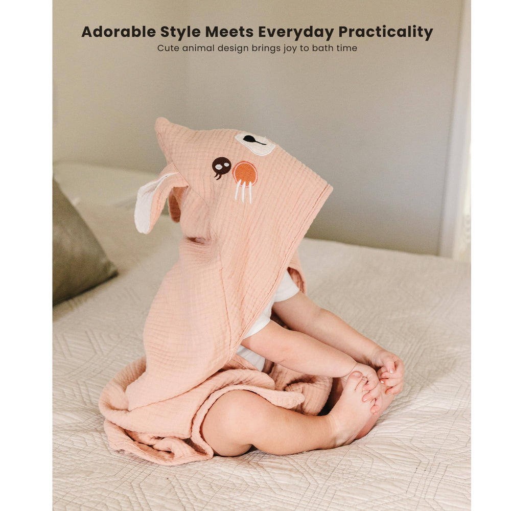 Konssy baby towel travel-friendly design fits in any diaper bag.