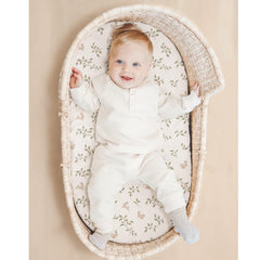 Konssy bassinet sheets two-pack folded, highlighting value and easy care.