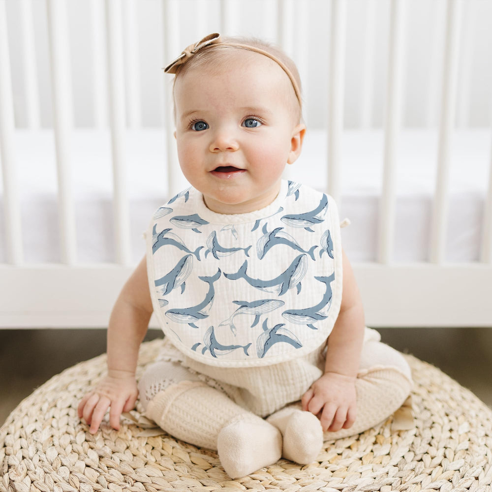 Konssy bib-washable-care indicates easy machine washing and quick drying