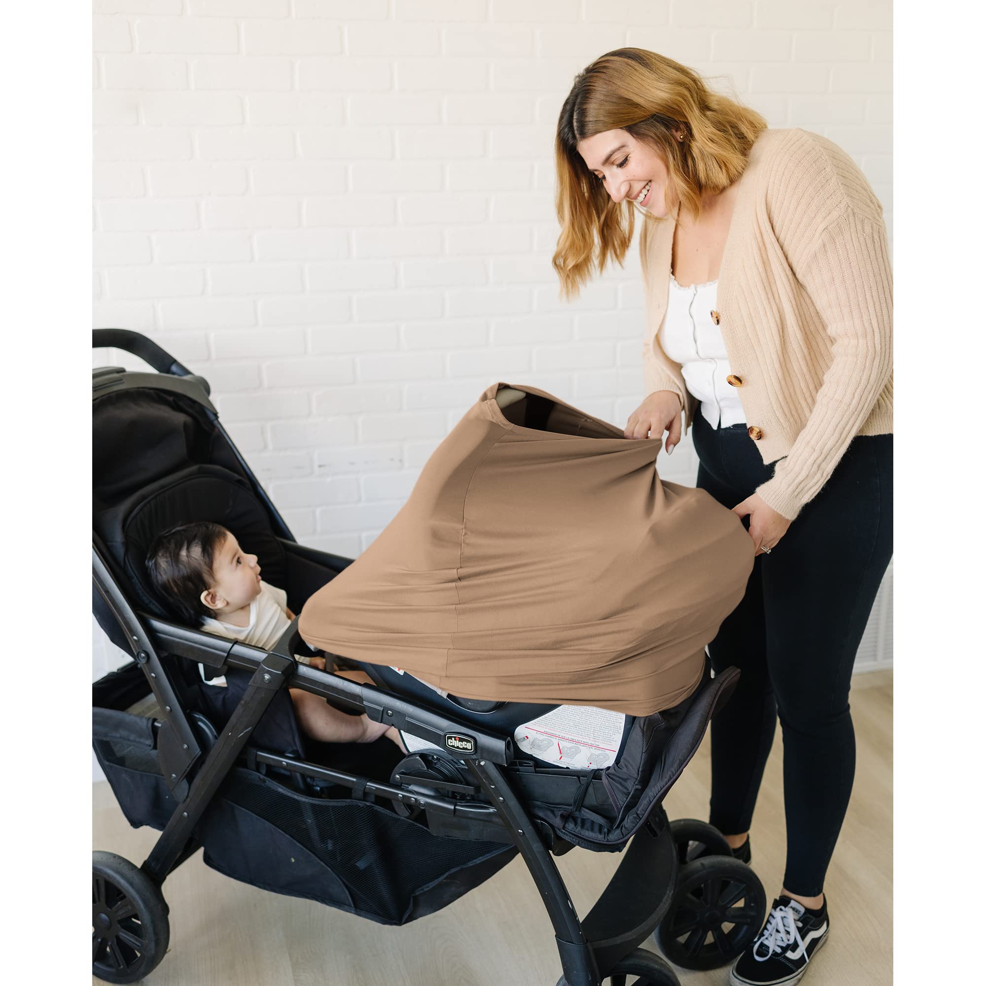 Konssy car seat cover offers sun protection for on-the-go infants.