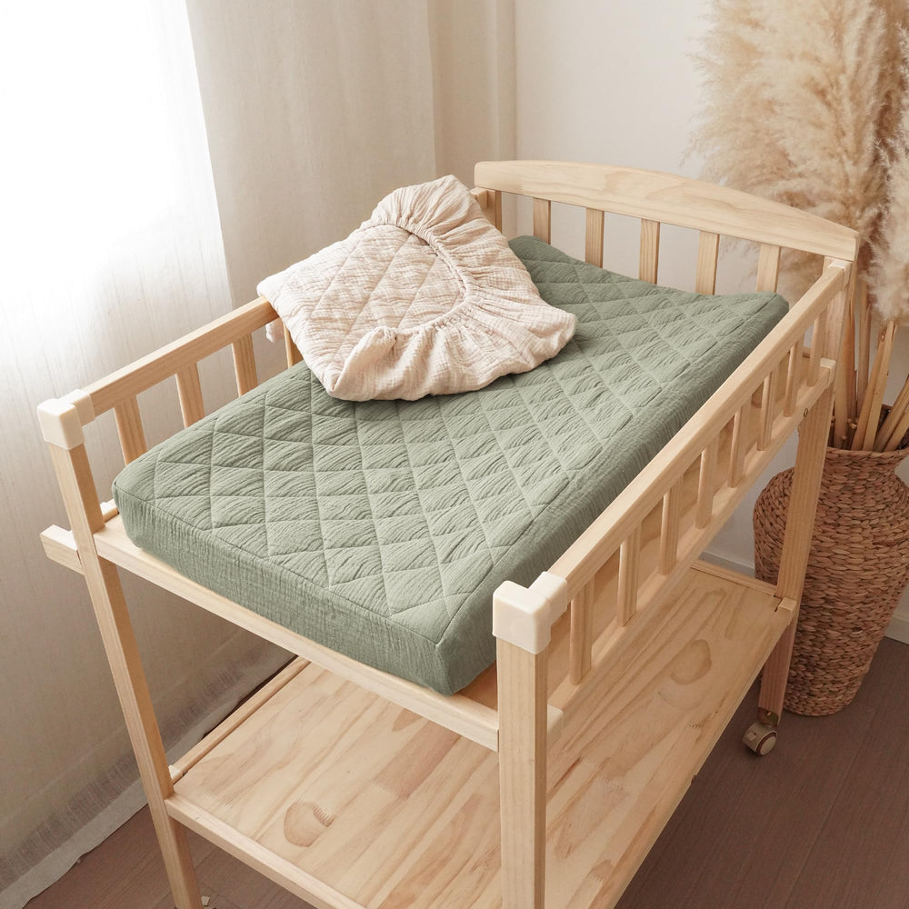 Konssy fog green and cream colorway complements nursery decor