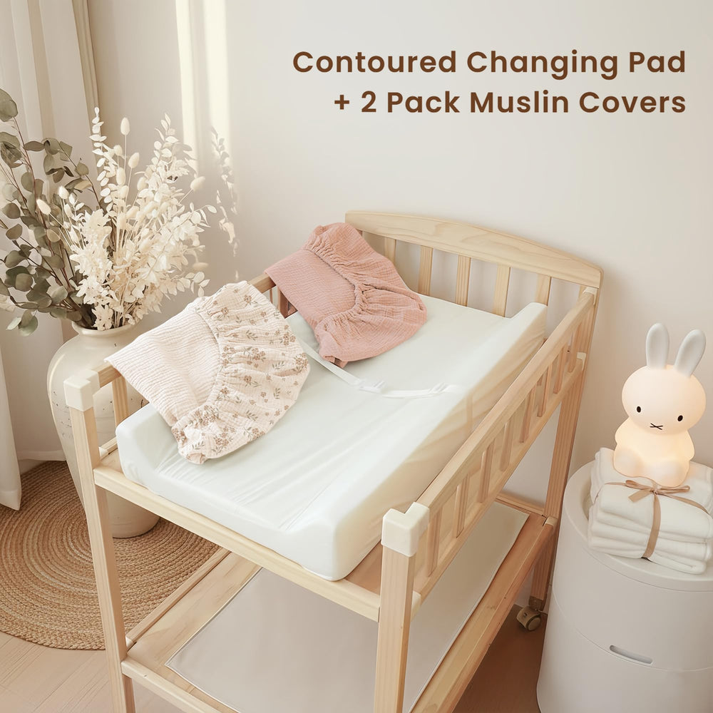 Nursery scene with Konssy changing pad for smooth diaper changes.