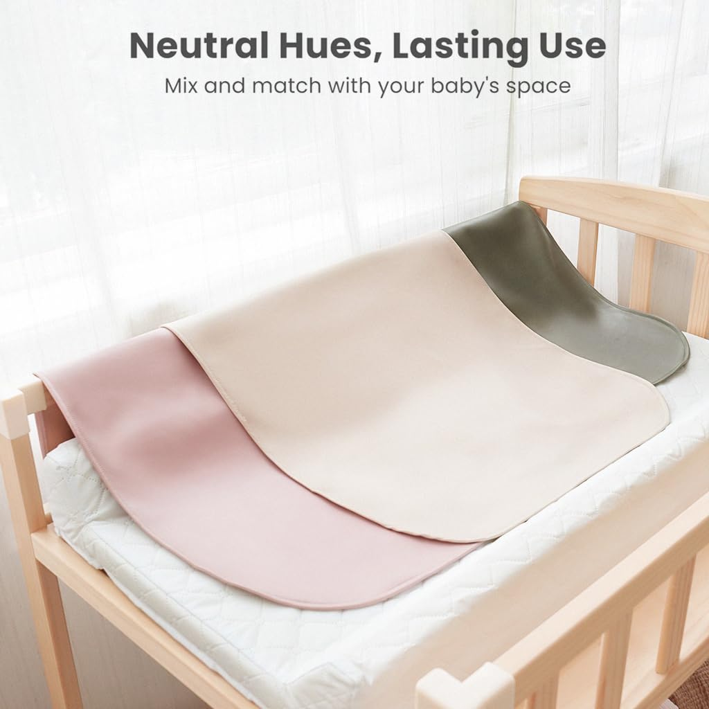 Konssy faux leather baby changing mat in beige color for neutral everyday use.