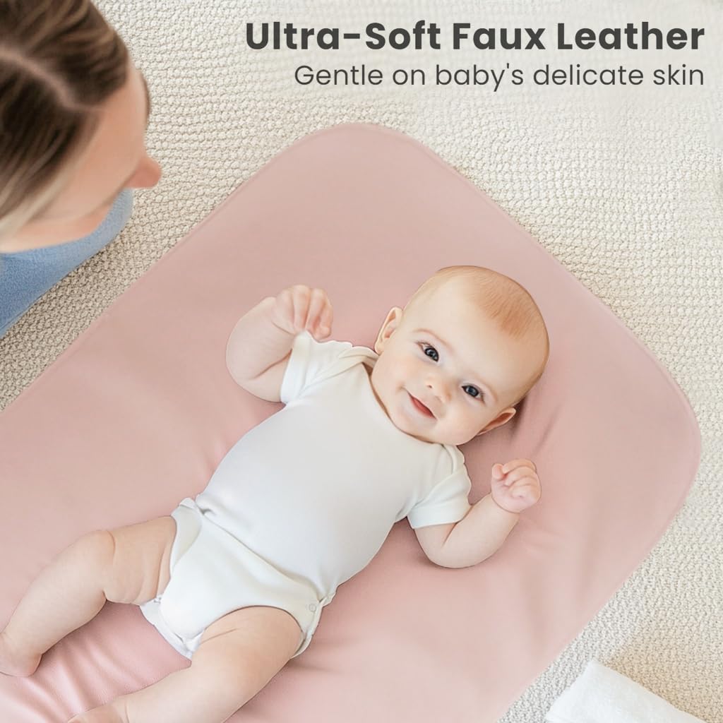 Konssy faux leather changing mat wipe-clean closeup demonstrates waterproof surface.