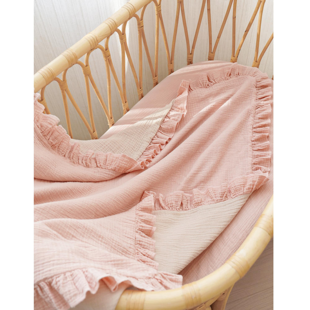 Konssy Flounce Muslin Blanket floral design adds charming nursery style.