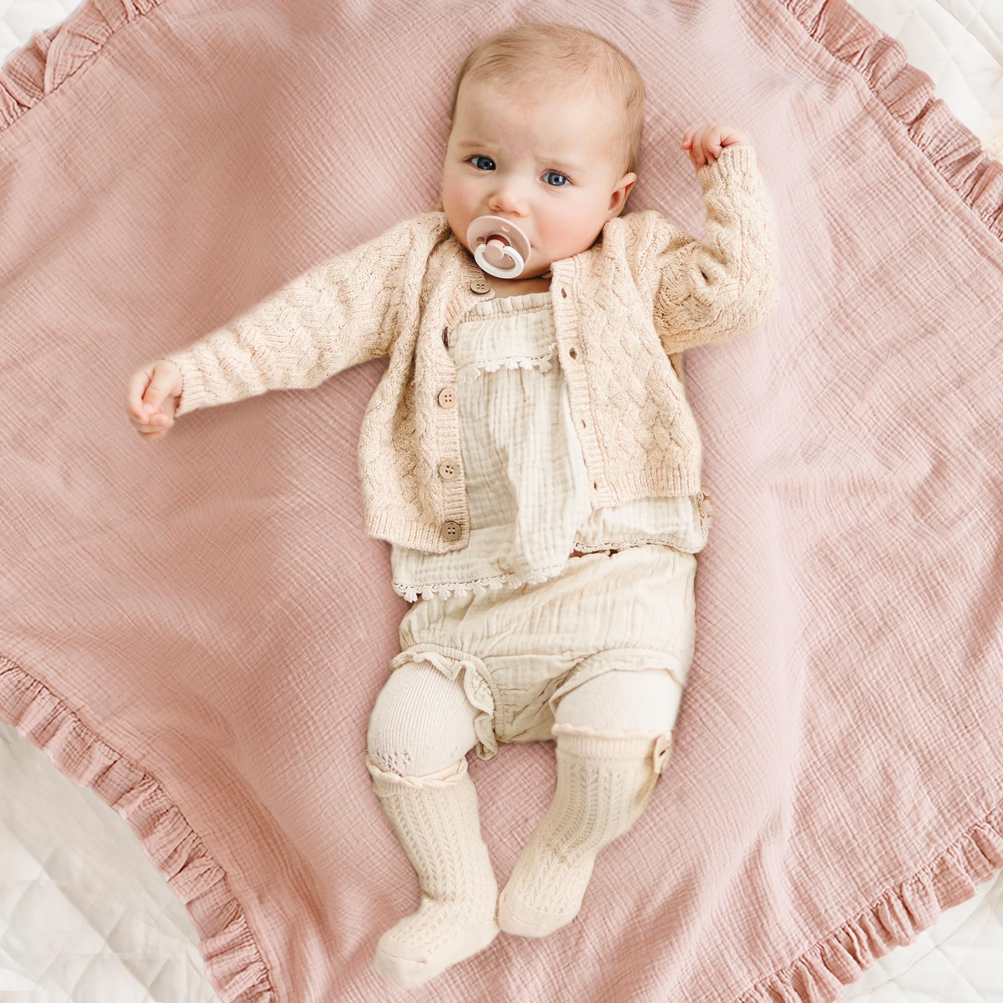 Konssy Flounce Muslin Blanket used as stroller cover protects from sun and wind.
