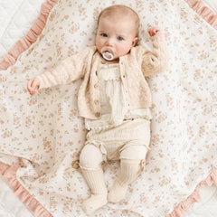 Konssy Flounce Muslin Blanket used as stroller cover for on-the-go shade