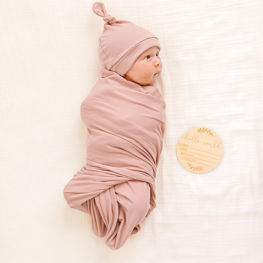 Konssy headband on a baby’s head shows elastic fit for different sizes