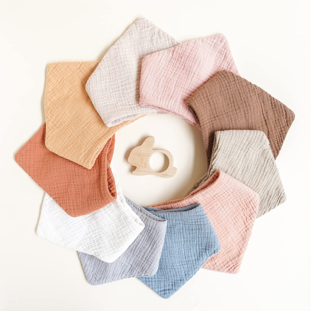 Konssy multi-use bib doubles as burp cloth and washcloth.