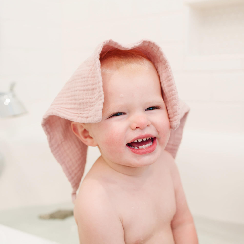 Konssy multi-use washcloth used as burp cloth or towel