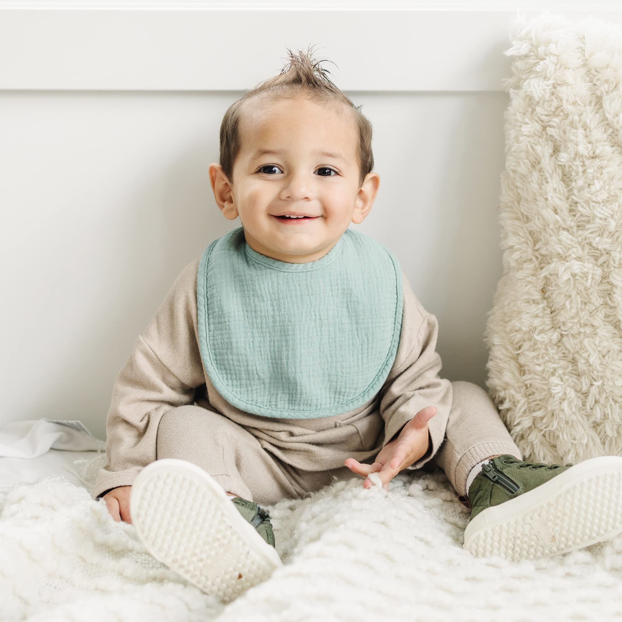 Konssy Muslin Baby Bibs used as burp cloths for soothing feed time cleanups.