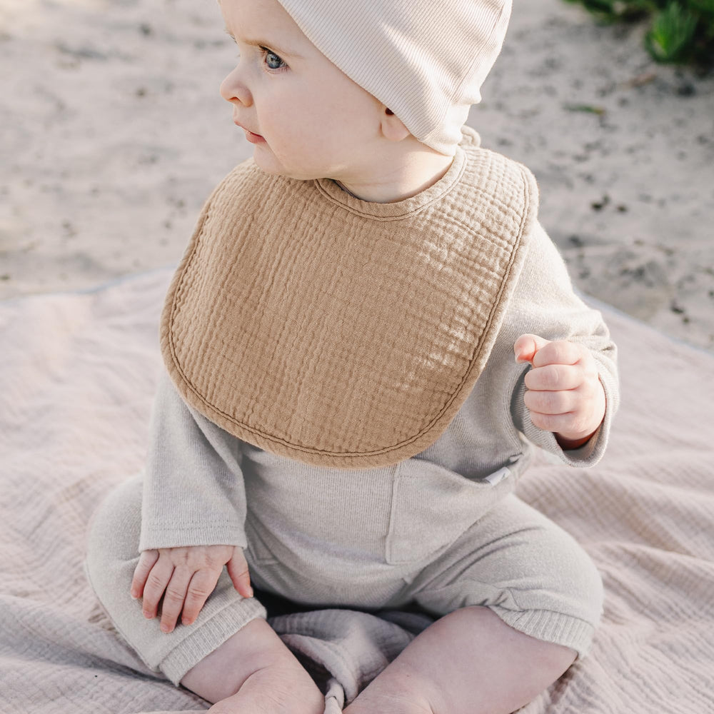 Konssy muslin baby bib multiuse burp cloth versatility.