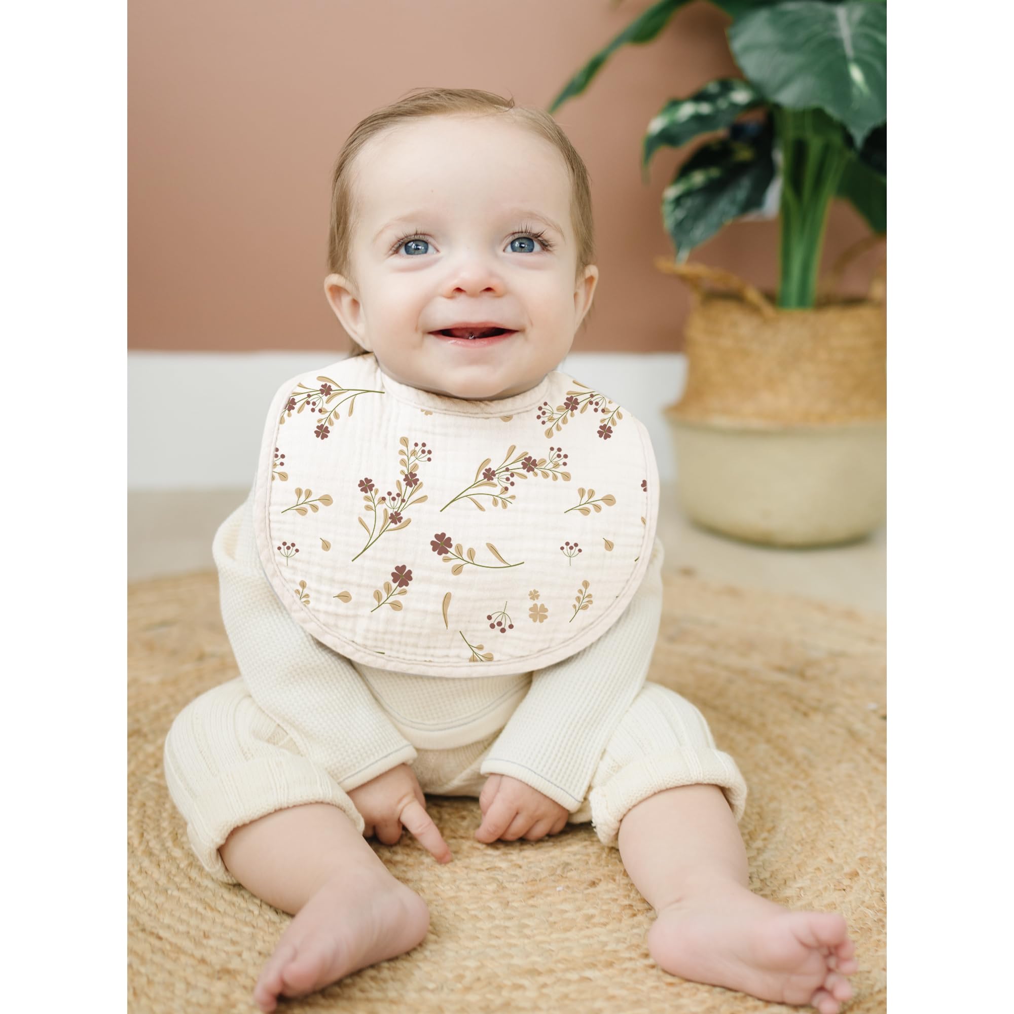 Konssy muslin bibs arranged with unisex patterns
