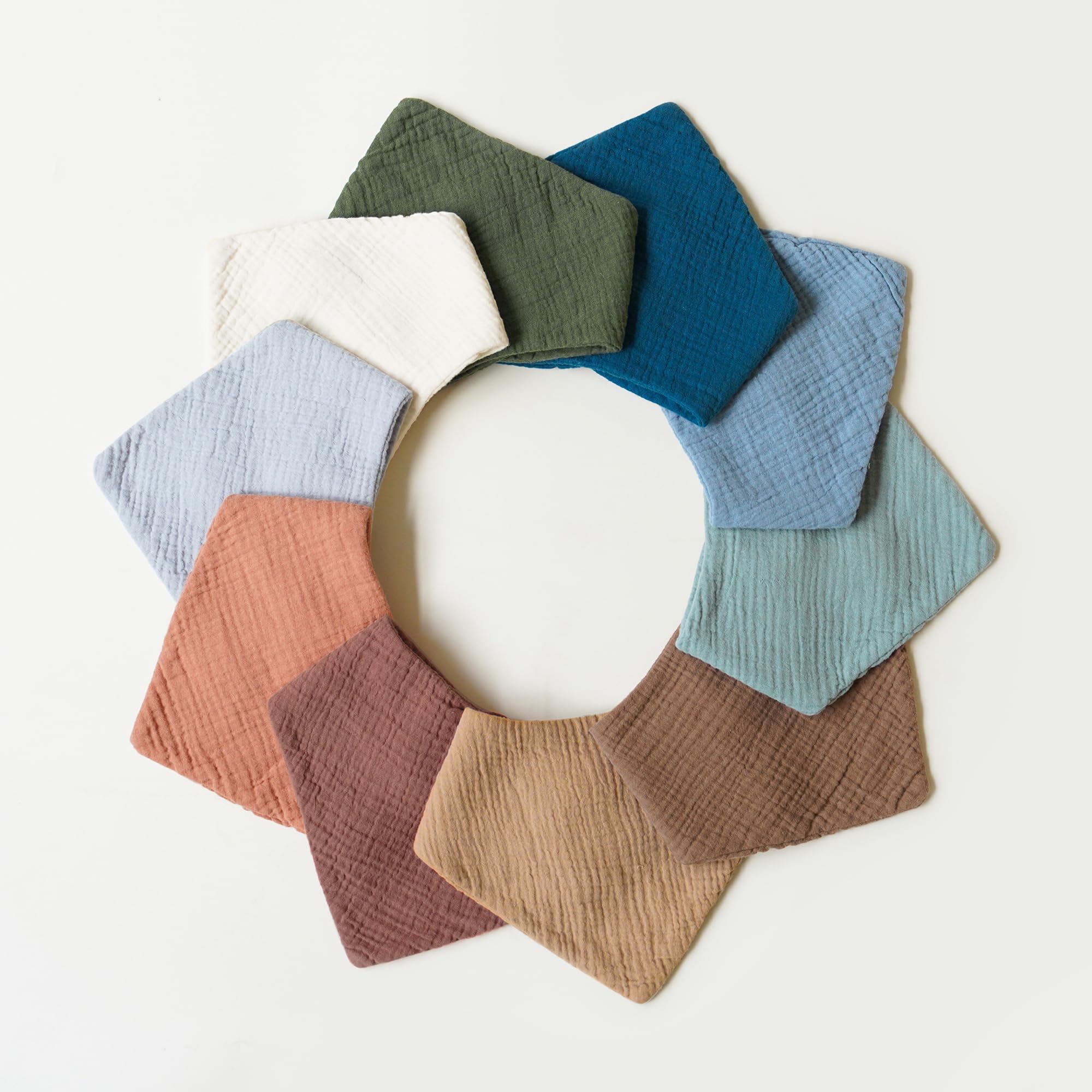Konssy muslin baby bib used as washcloth-use for soft cleansing on the go.