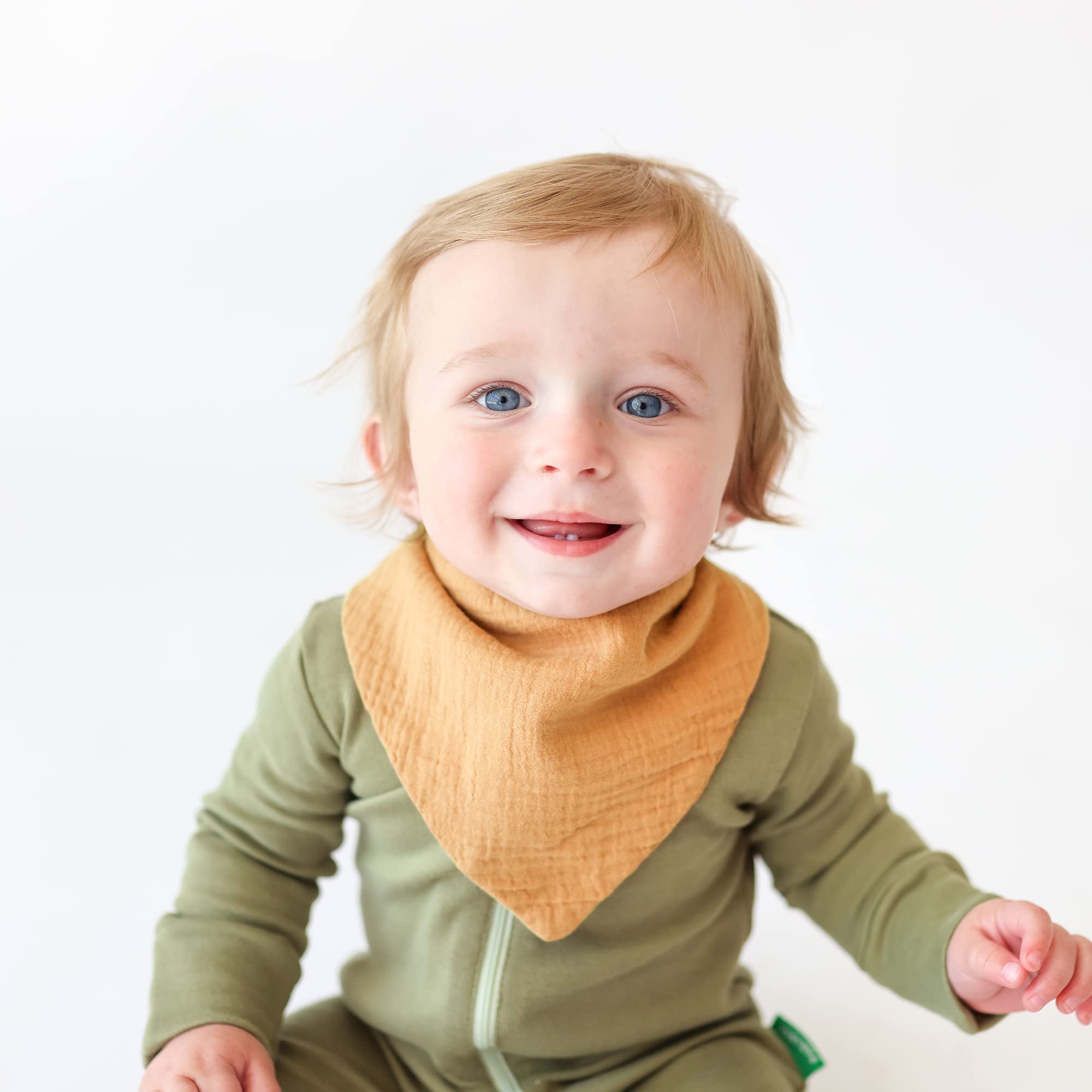 Konssy Muslin Baby Bibs folded for compact on-the-go use, easy to store.