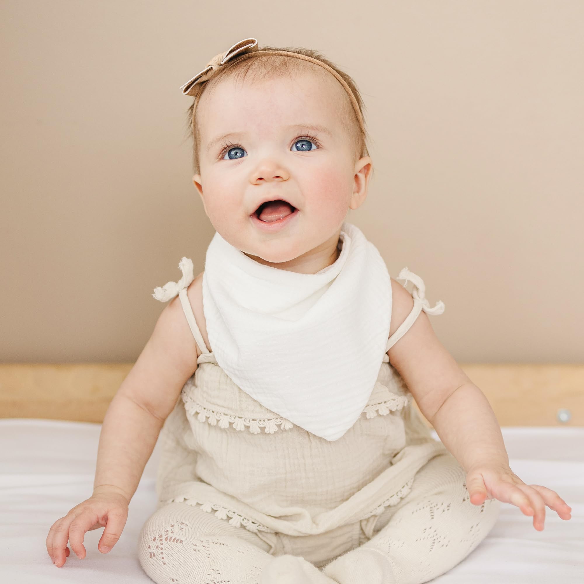 Konssy muslin baby bibs closeup-absorbent cotton highlights soft texture for drool control.