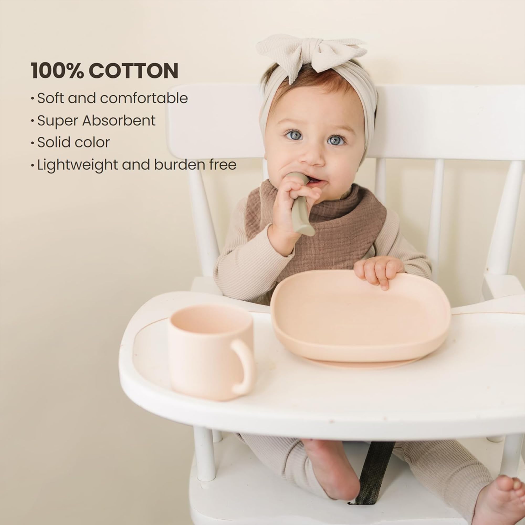 Konssy Muslin Baby Bibs worn on baby for a comfy teething moment.