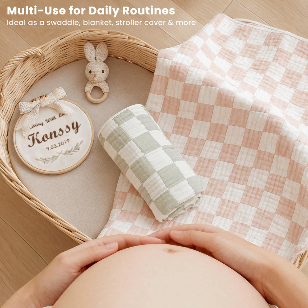 Konssy Muslin Baby Blanket in green gingham adds nursery style