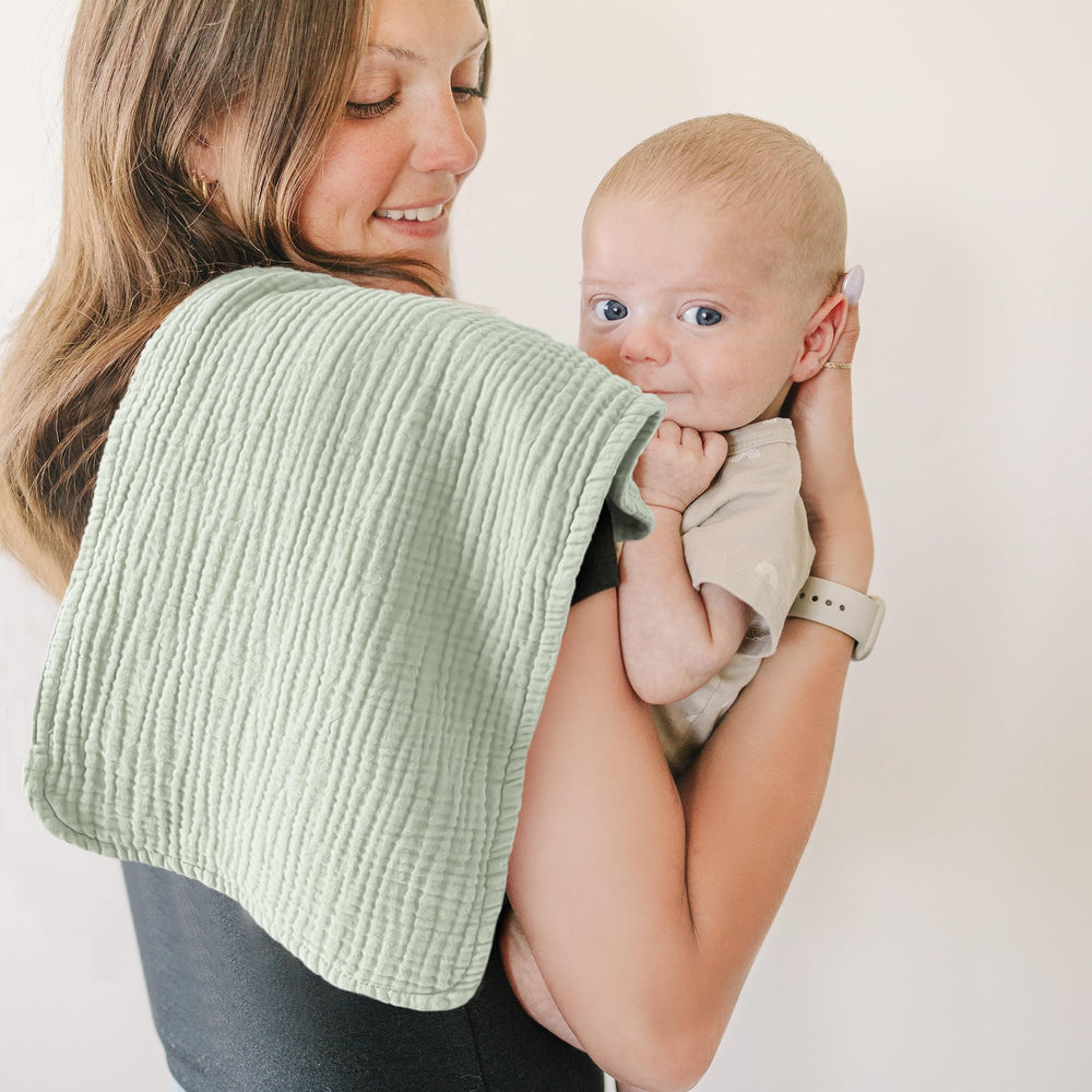 Konssy muslin burp cloths in gender-neutral colors for any outfit.