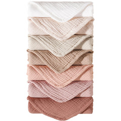 Konssy muslin burp cloths seven-pack flatlay for quick changes and coordinated nursery outfits