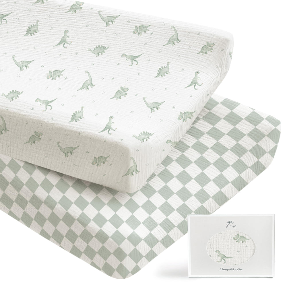 Konssy muslin changing pad cover green dino closeup for ultra-soft skin comfort.