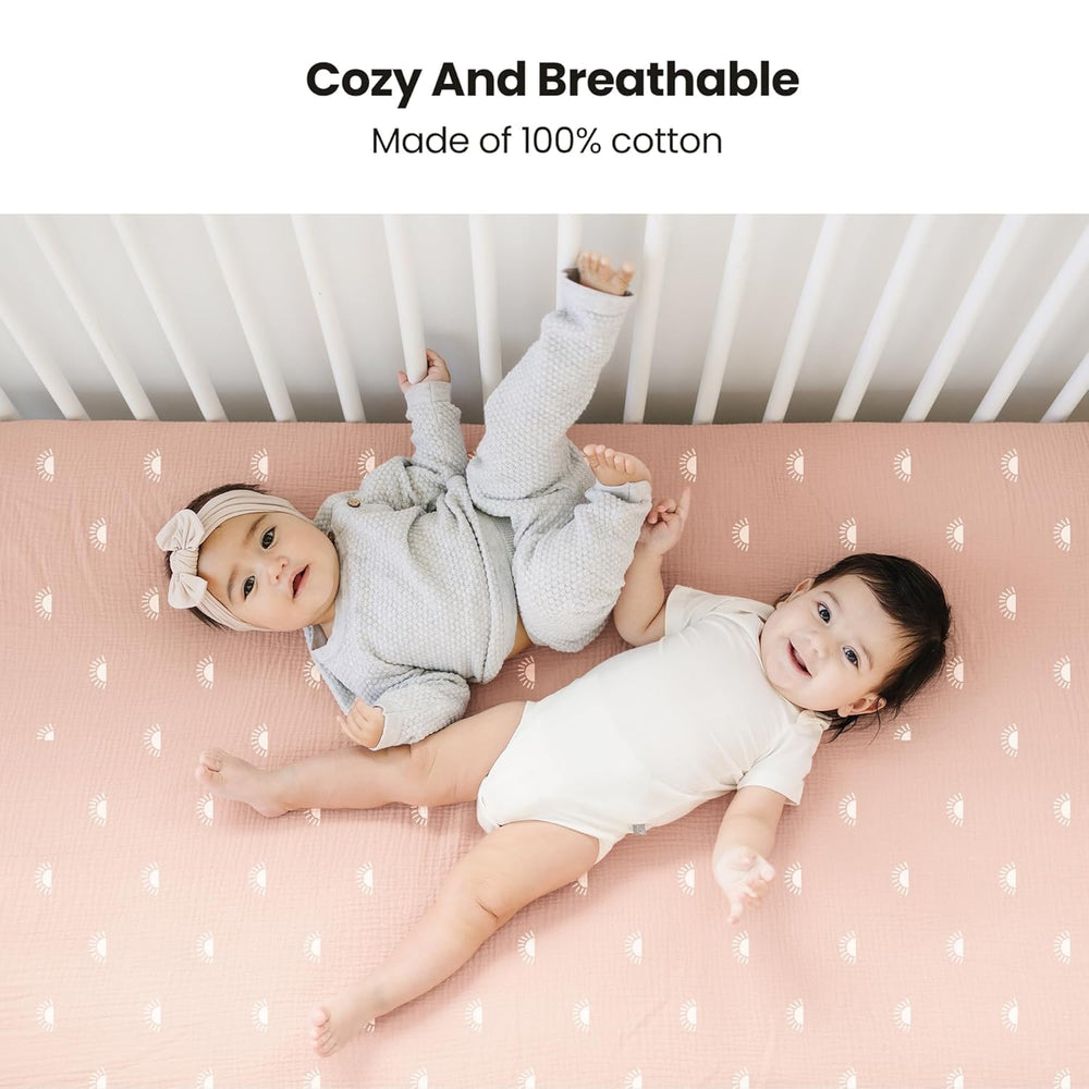 Konssy muslin crib sheet in khaki leaf provides cozy sleep with skin-friendly fabric.