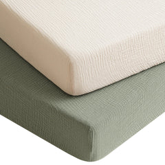 Konssy muslin crib sheets 2-pack in fog green cream set offer soft, breathable baby comfort.