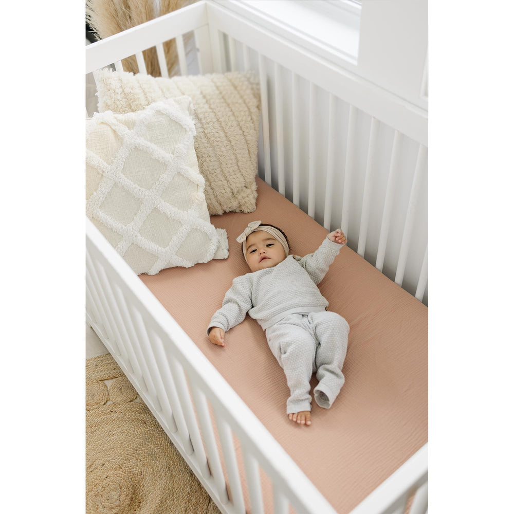 Konssy Muslin Crib Sheets 360-elastic-fit keeps sheet in place during baby moves.