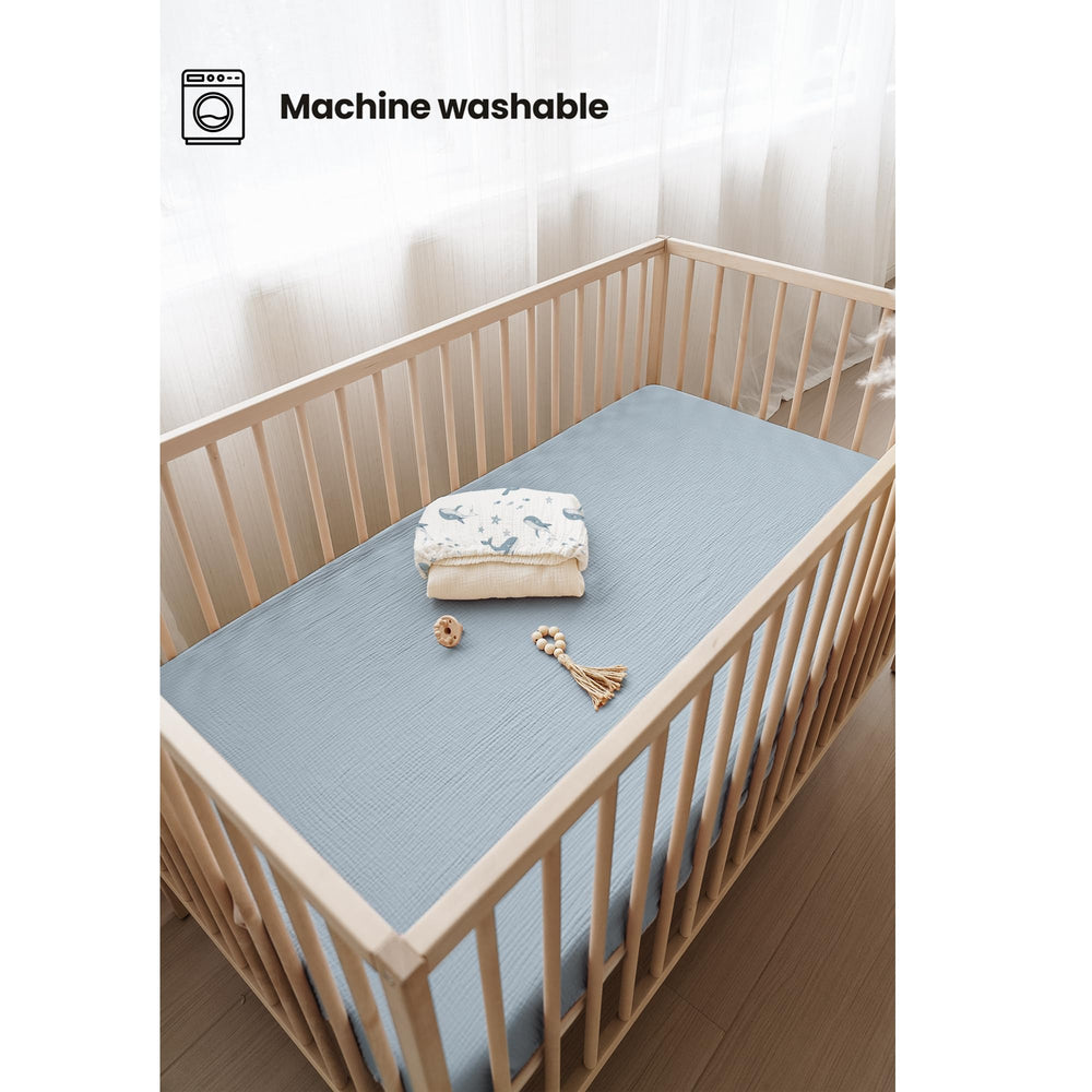 Konssy muslin crib sheets breathable cotton fabric highlights airy sleep surface.