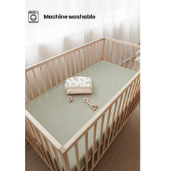 Konssy muslin crib sheets close-up highlights 100% cotton texture and softness.