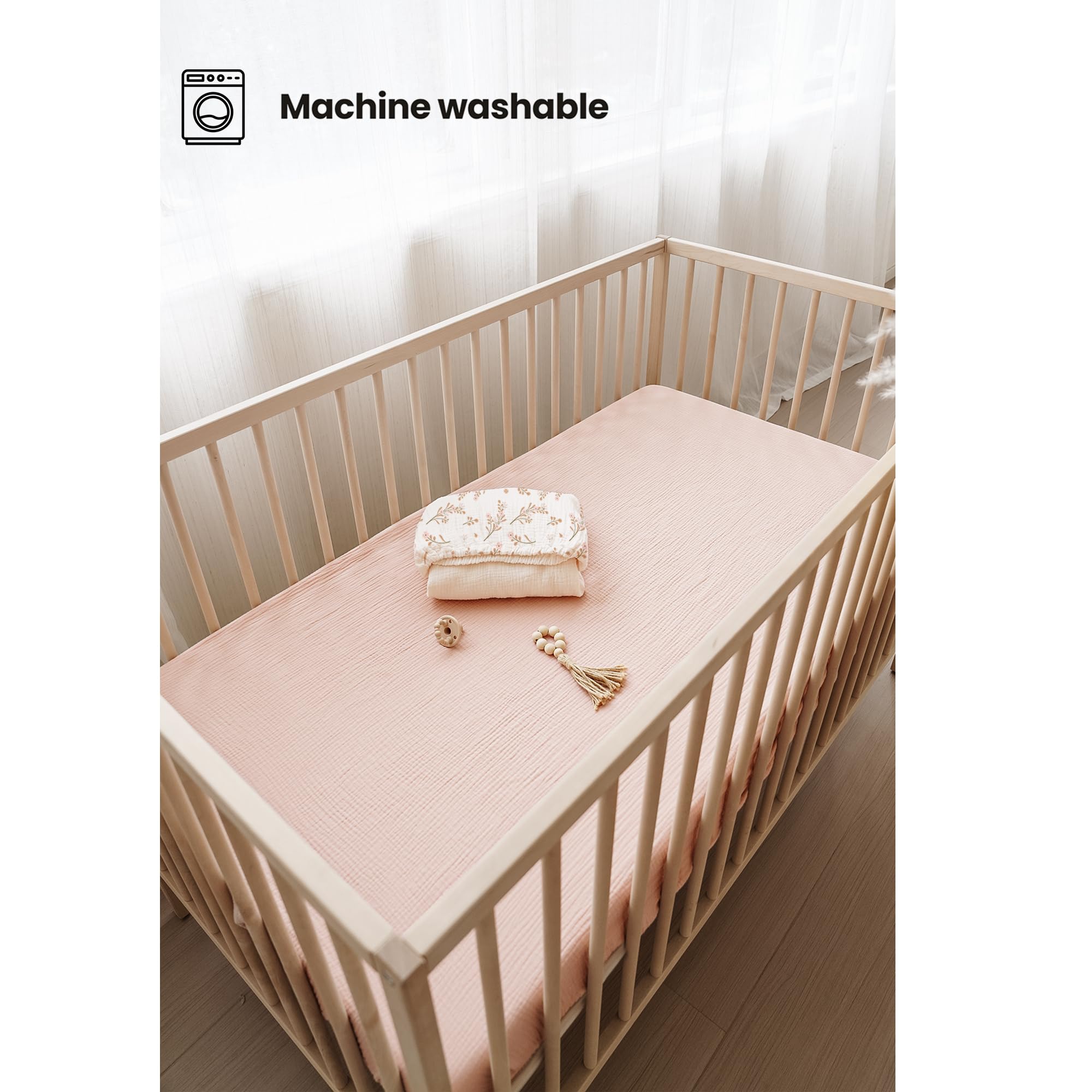 Konssy floral pink print crib sheet adds gentle nursery style