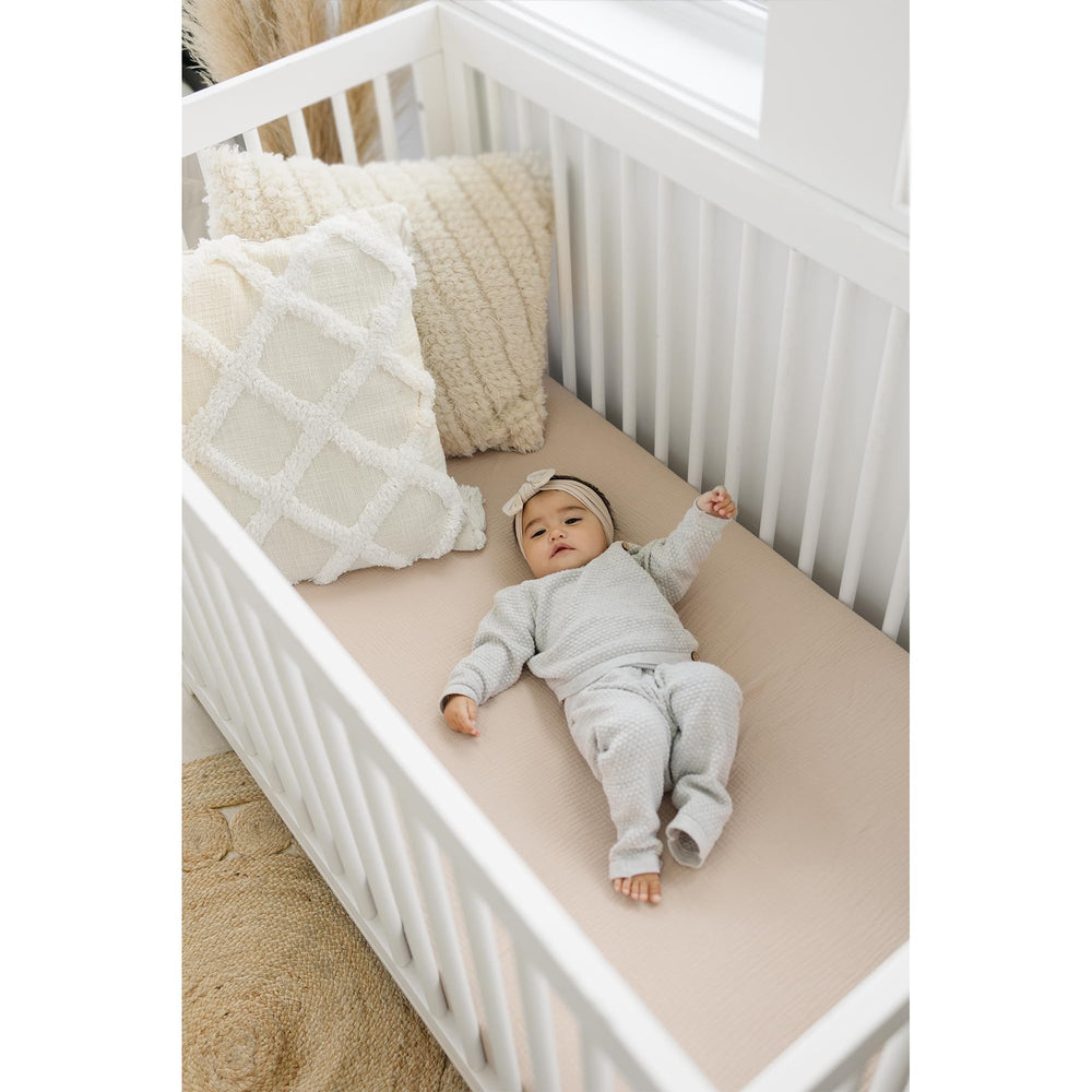 Konssy muslin crib sheets fully encased elastic snug fit prevents sheet creep.