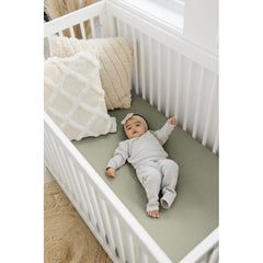 Close-up of Konssy muslin cotton texture highlighting ultra-soft surface for delicate baby skin.