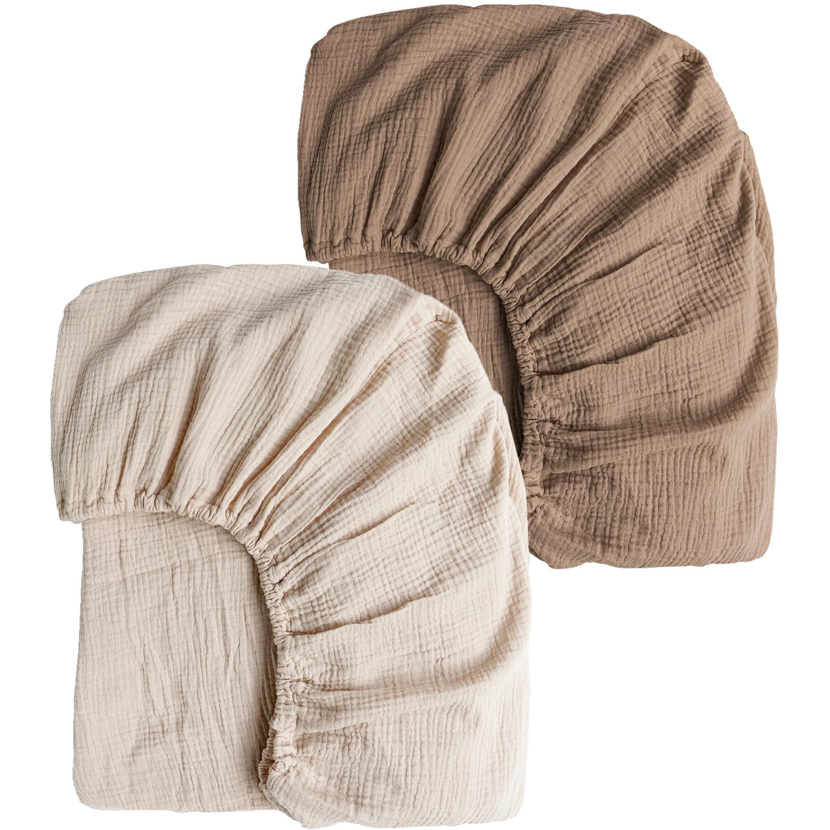 Konssy Muslin crib sheets two-pack on crib mattress delivering cozy breathable comfort.