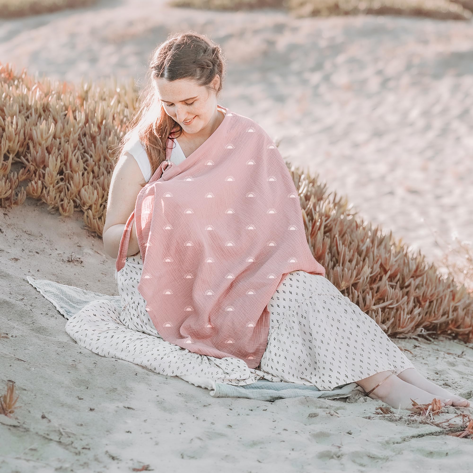 Konssy nursing cover doubles as car seat canopy on the go