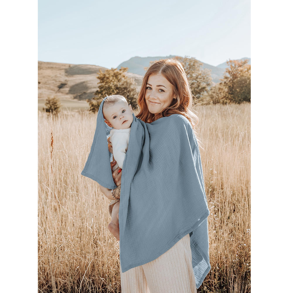 Konssy Muslin Nursing Cover doubles as a car seat canopy for sun protection on outings.