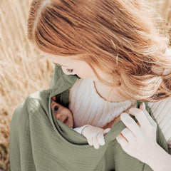 Konssy-muslin-nursing-cover-car-seat-cover doubles as a protective car-seat canopy.