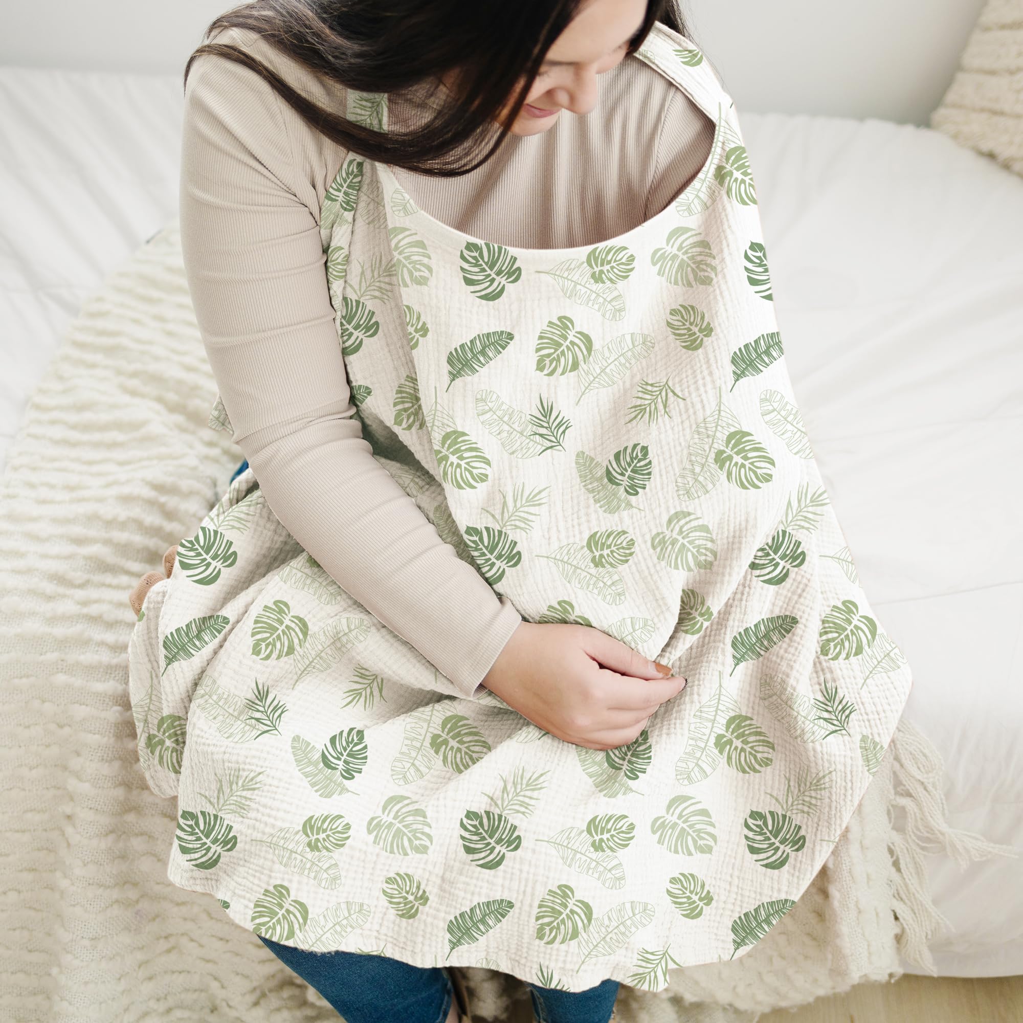 Konssy nursing cover - rigid hoop and adjustable neckline for easy baby visibility.