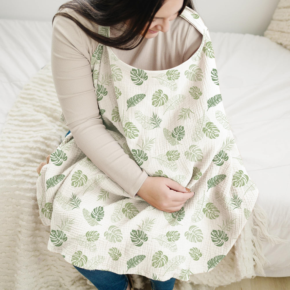 Konssy nursing cover - rigid hoop and adjustable neckline for easy baby visibility.