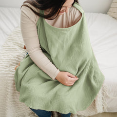 Konssy muslin cover on model showing soft fabric and airflow.