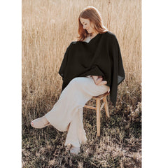 Konssy muslin cover features soft-touch fabric against baby's skin.