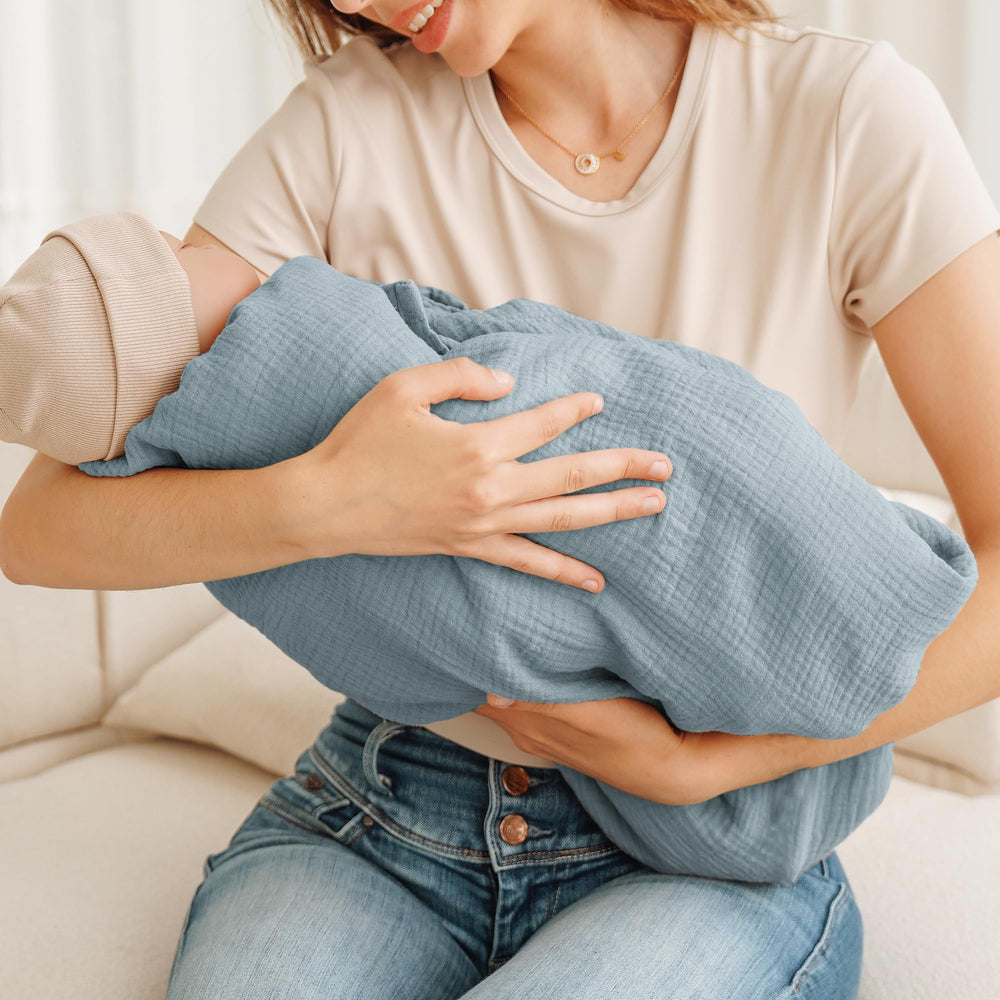 Konssy Muslin Nursing Cover works as a stroller cover during travel or strolls.