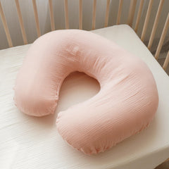 Konssy Muslin nursing pillow cover with removable zipper for quick cleaning.