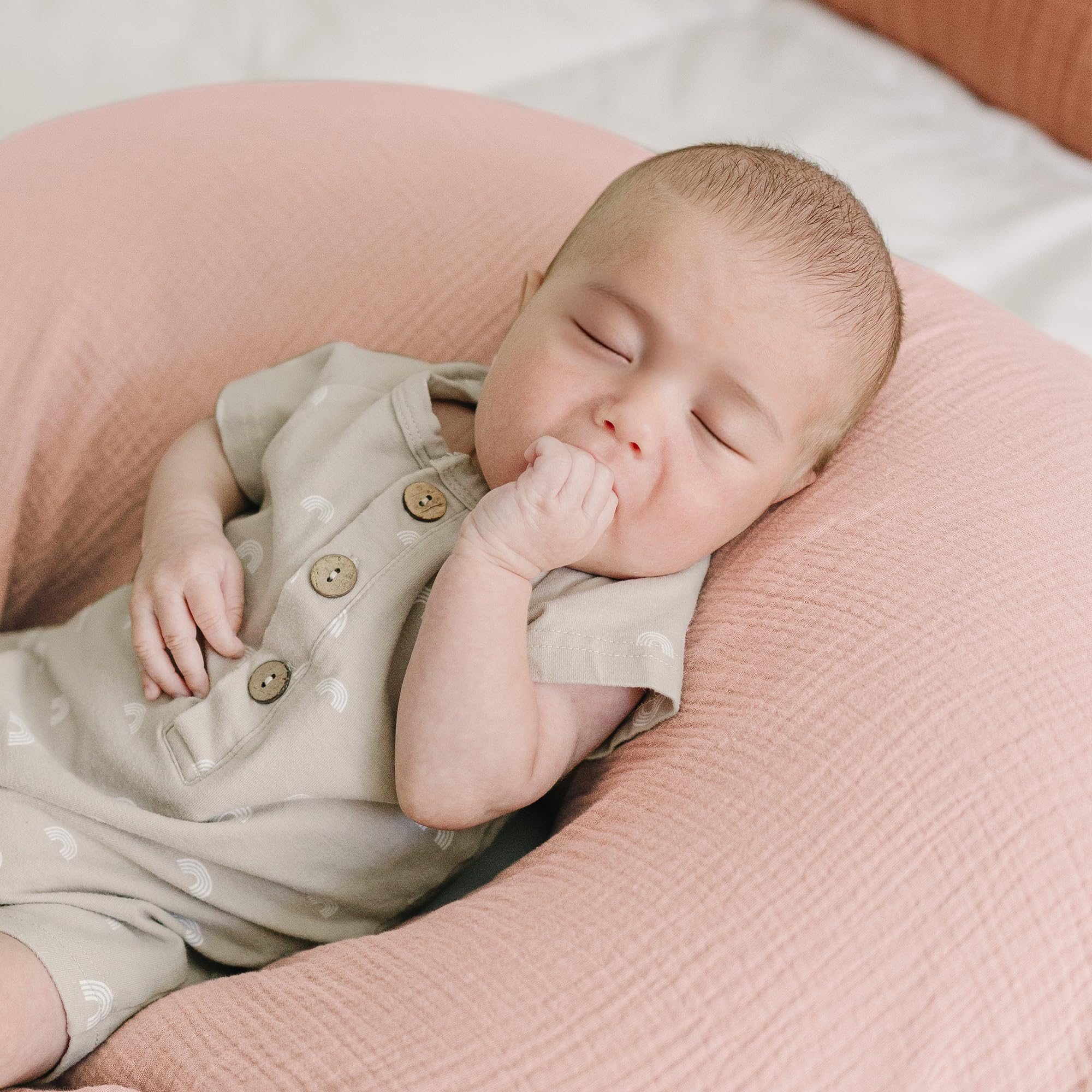 Konssy Muslin pillow slipcover resists stains to keep feeding space tidy.