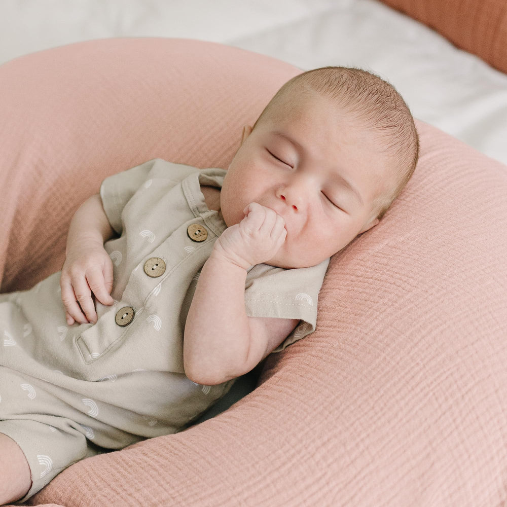 Konssy Muslin pillow slipcover resists stains to keep feeding space tidy.