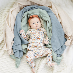 Konssy muslin swaddle blanket soft texture closeup highlighting breathable cotton