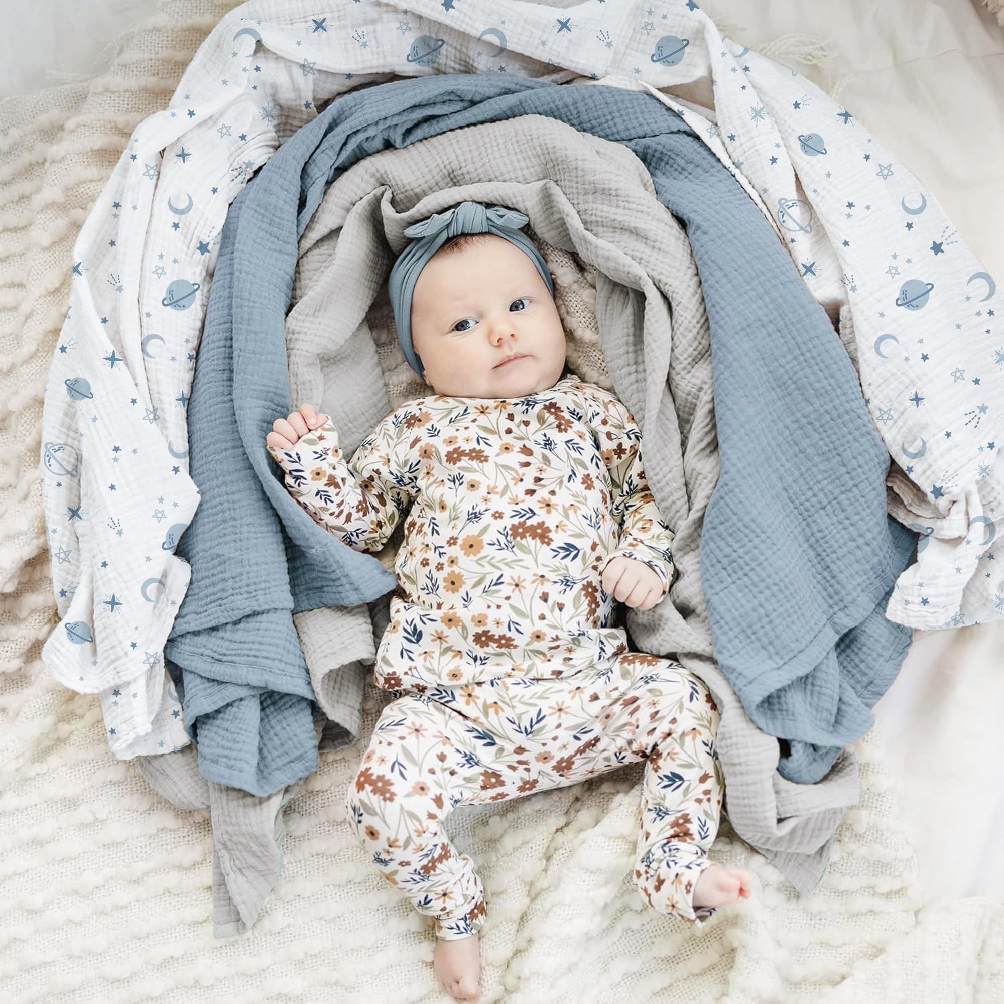 Konssy muslin swaddle blanket soft-touch close-up highlights breathable cotton fabric for baby comfort.