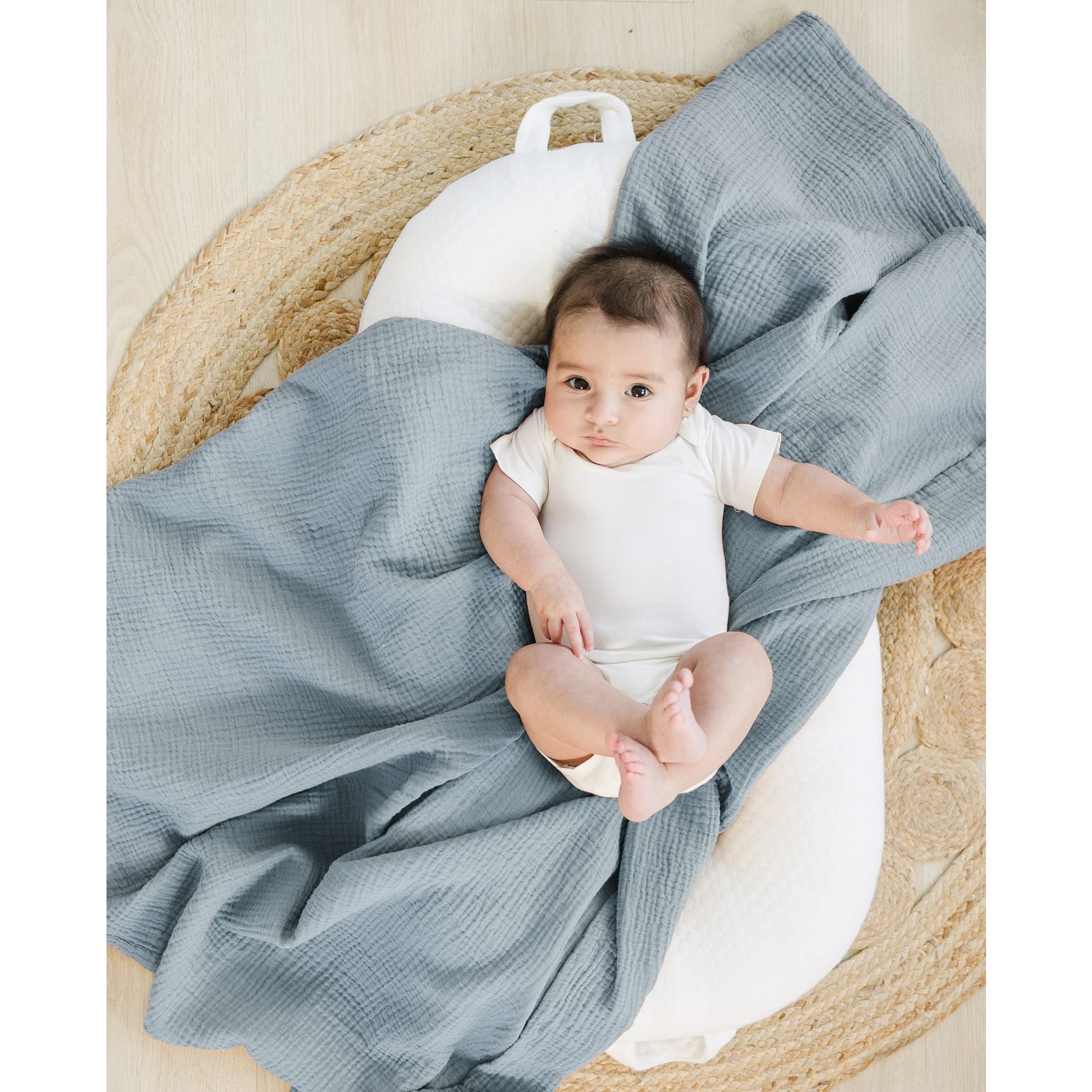 Konssy muslin swaddle used as stroller sun shade on a sunny day