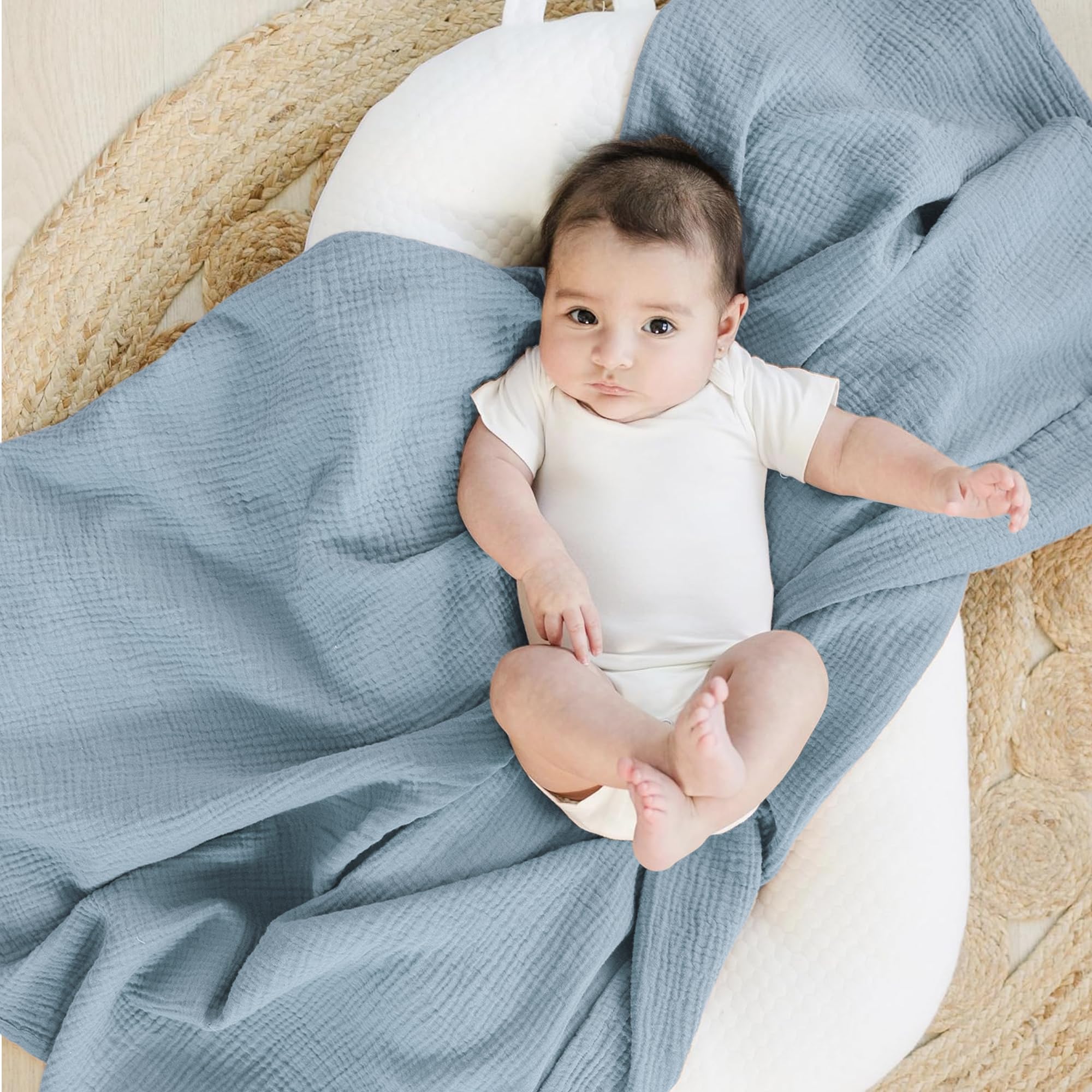 Konssy muslin swaddle blanket unisex design shown as versatile baby-care essential.